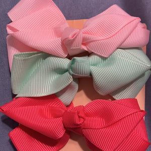 Pink and dark pink handmade medium size bows with bonus aqua bow